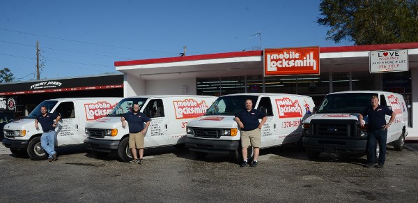 Mobile Locksmith Crew In front of Work Vans