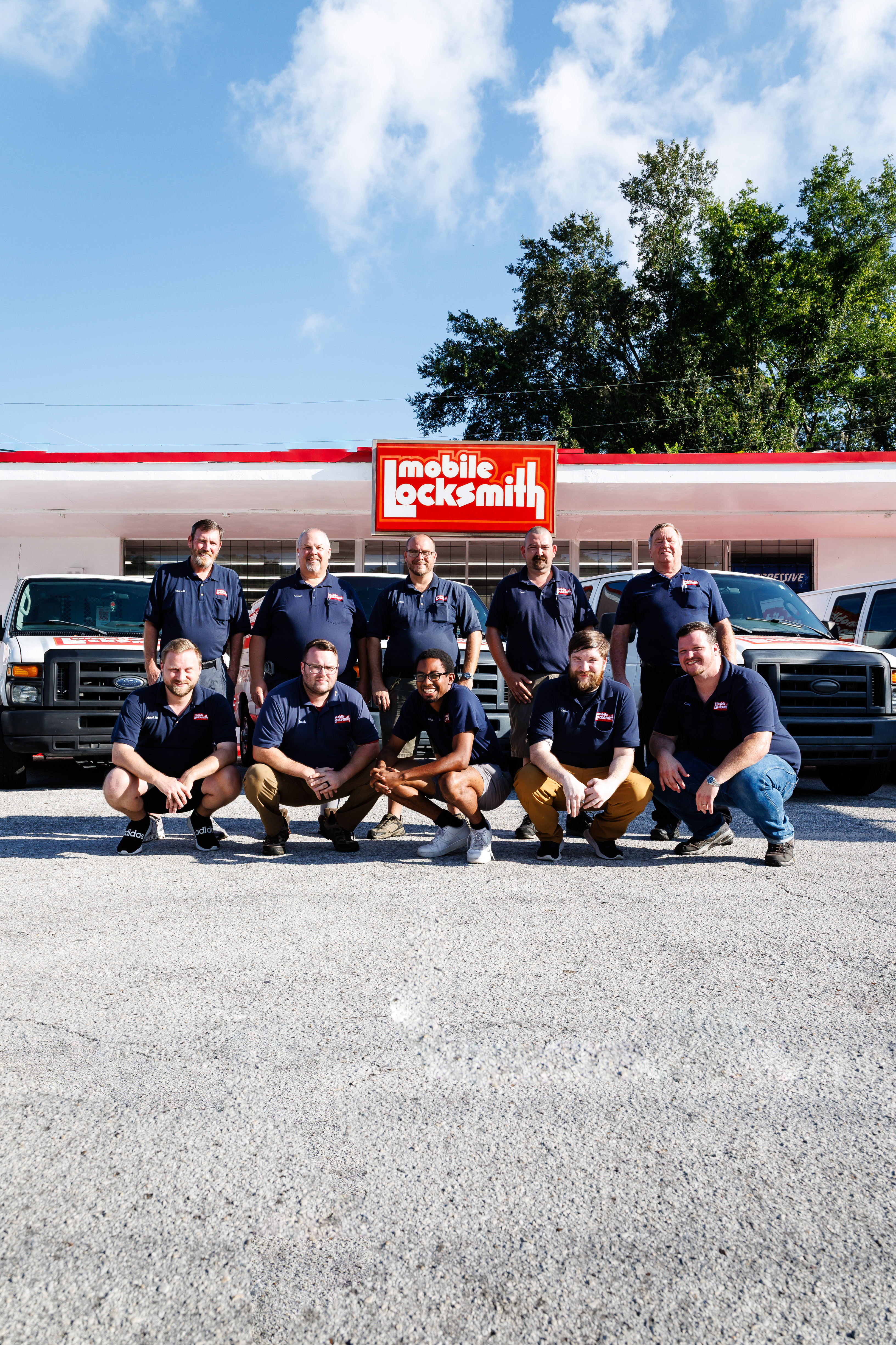 Mobile Locksmith team portrait at Gainesville storefront